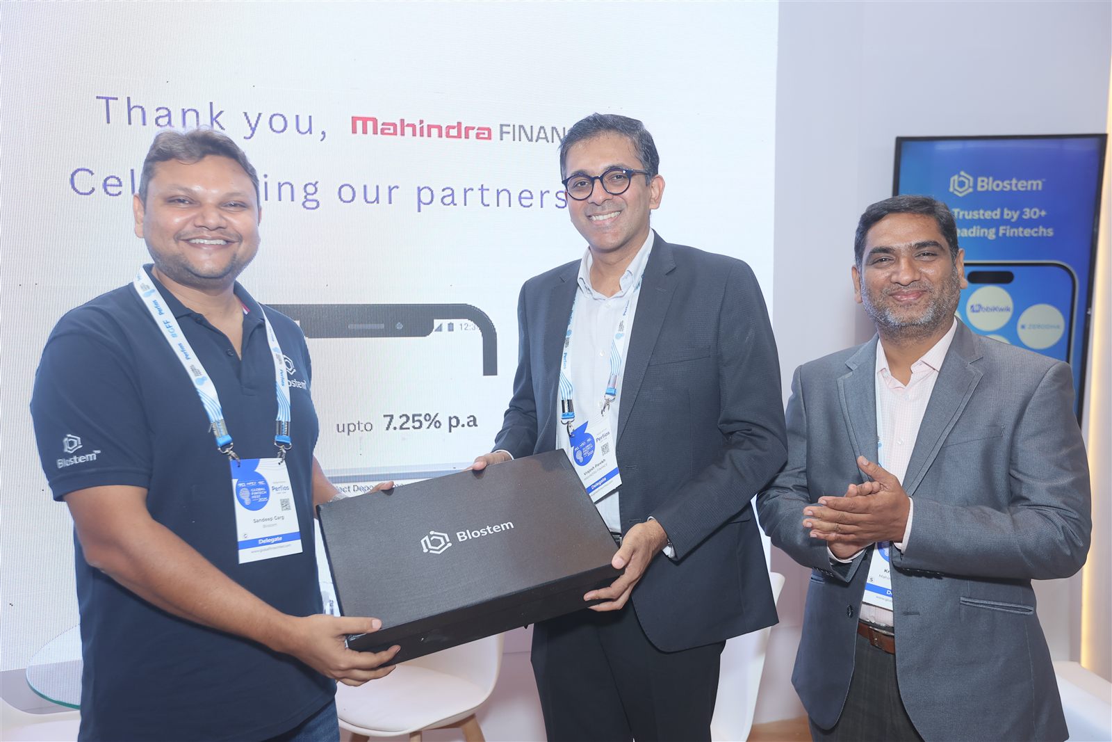 Felicitating Mahindra Finance at the Blostem booth